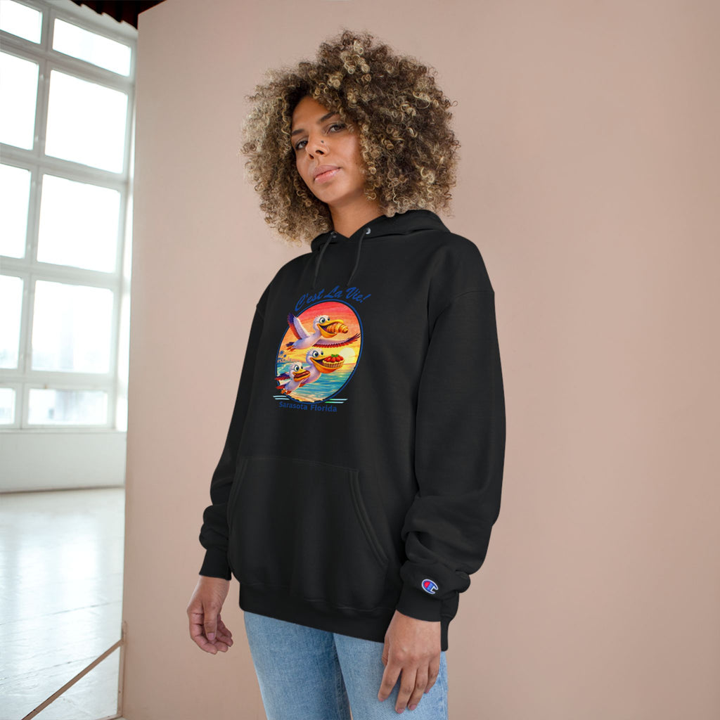 Champion Unisex Hoodie –  Pelican Sunset "C'est La Vie" Back Print